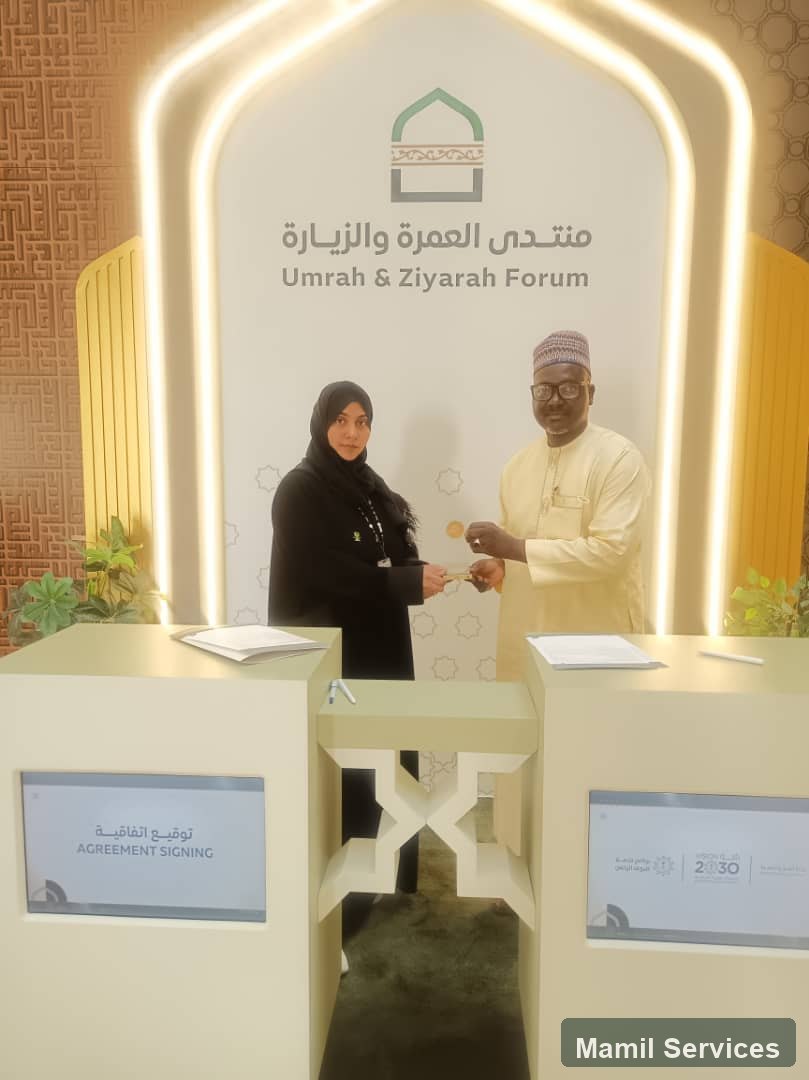 Mamil representative at an Umrah and Ziyarah forum signing